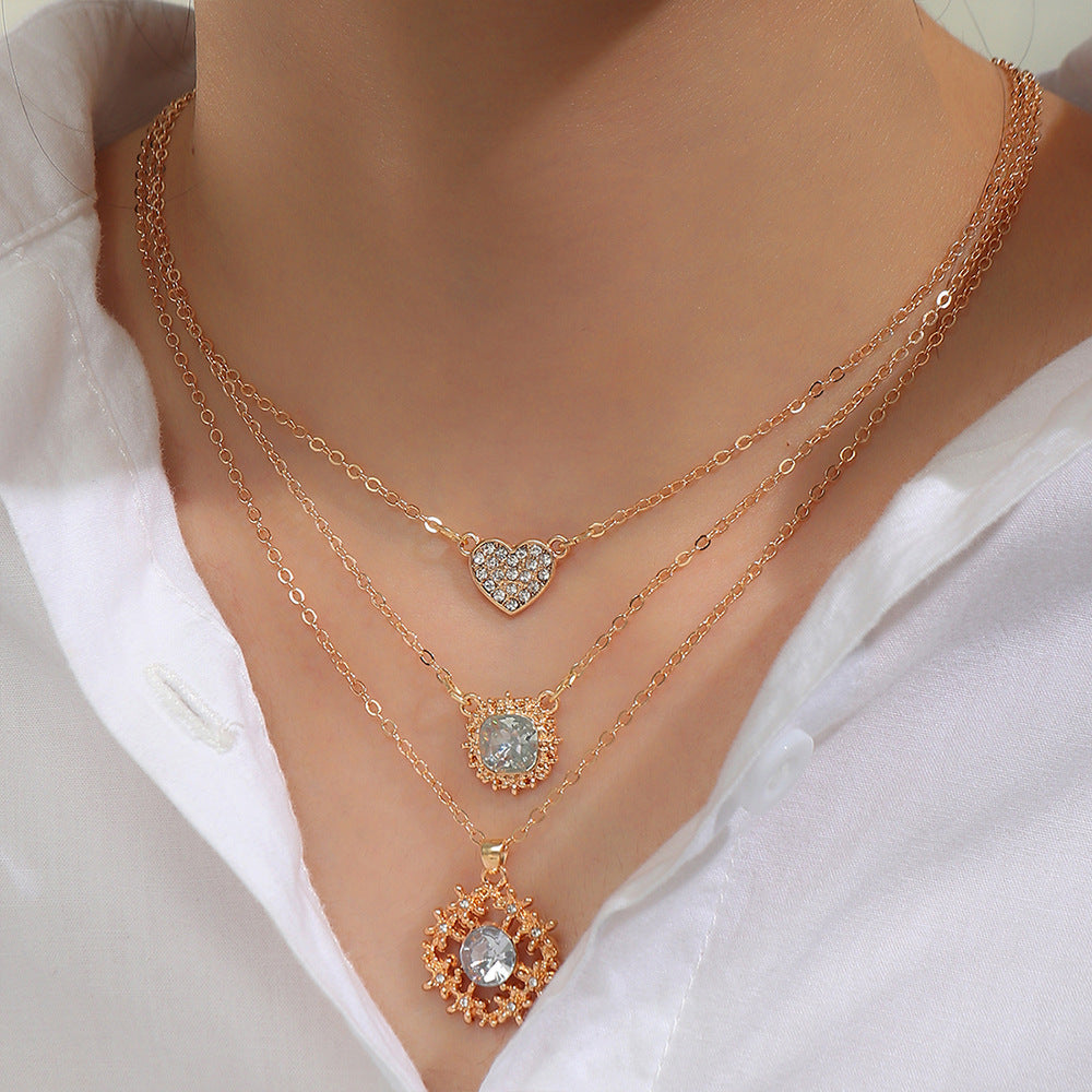 Wholesale diamond butterfly heart-shaped creative titanium steel necklace set and chain three-piece set